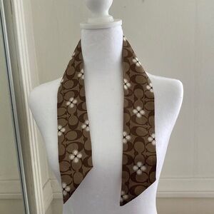 NWT 100 % SILK Reversible Coach brown and tan color pony tie.